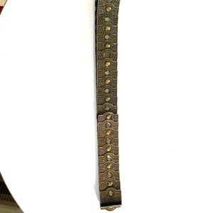 Woman’s Gold and Black Embossed Belt